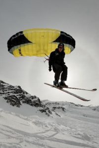 Parapente y esquí nieve